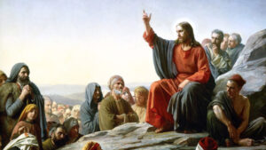Ein Gemälde von Jesus Christus au einem Berg mit erhobener Hand